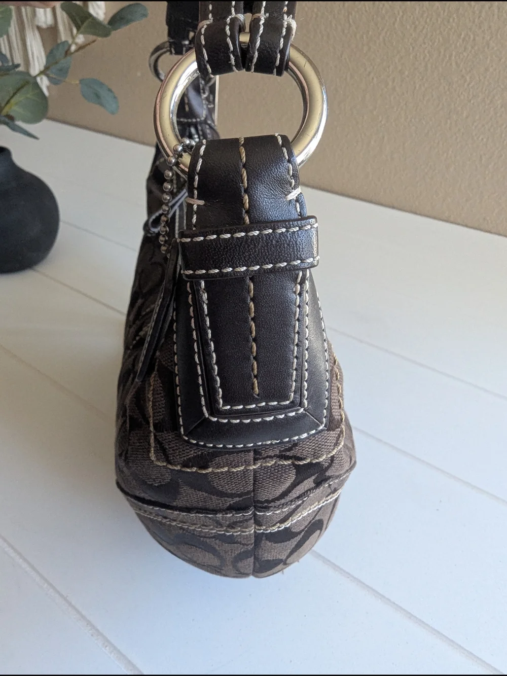 Vintage Coach SohoSignature Canvas HoboShoulder Bag in chocolate brown.
